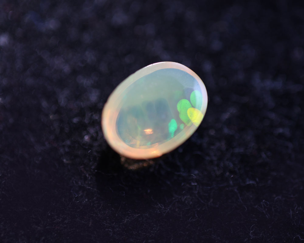 Snakeskin Wollo Opal oval 0.34 ct
