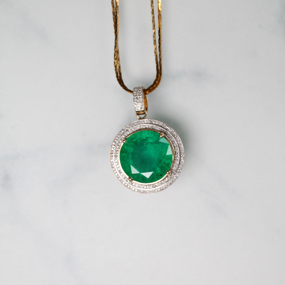 Bespoke Diamond encrusted Emerald pendant