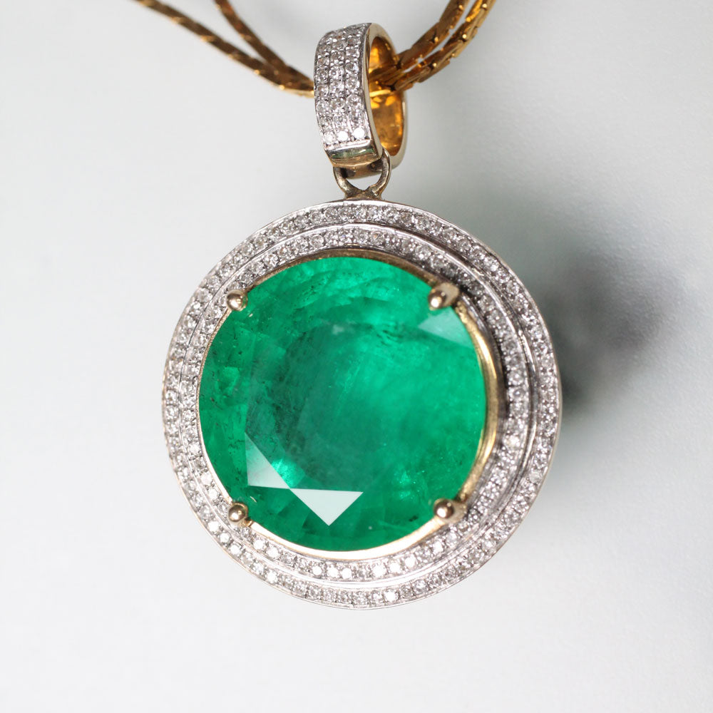 Bespoke Diamond encrusted Emerald pendant