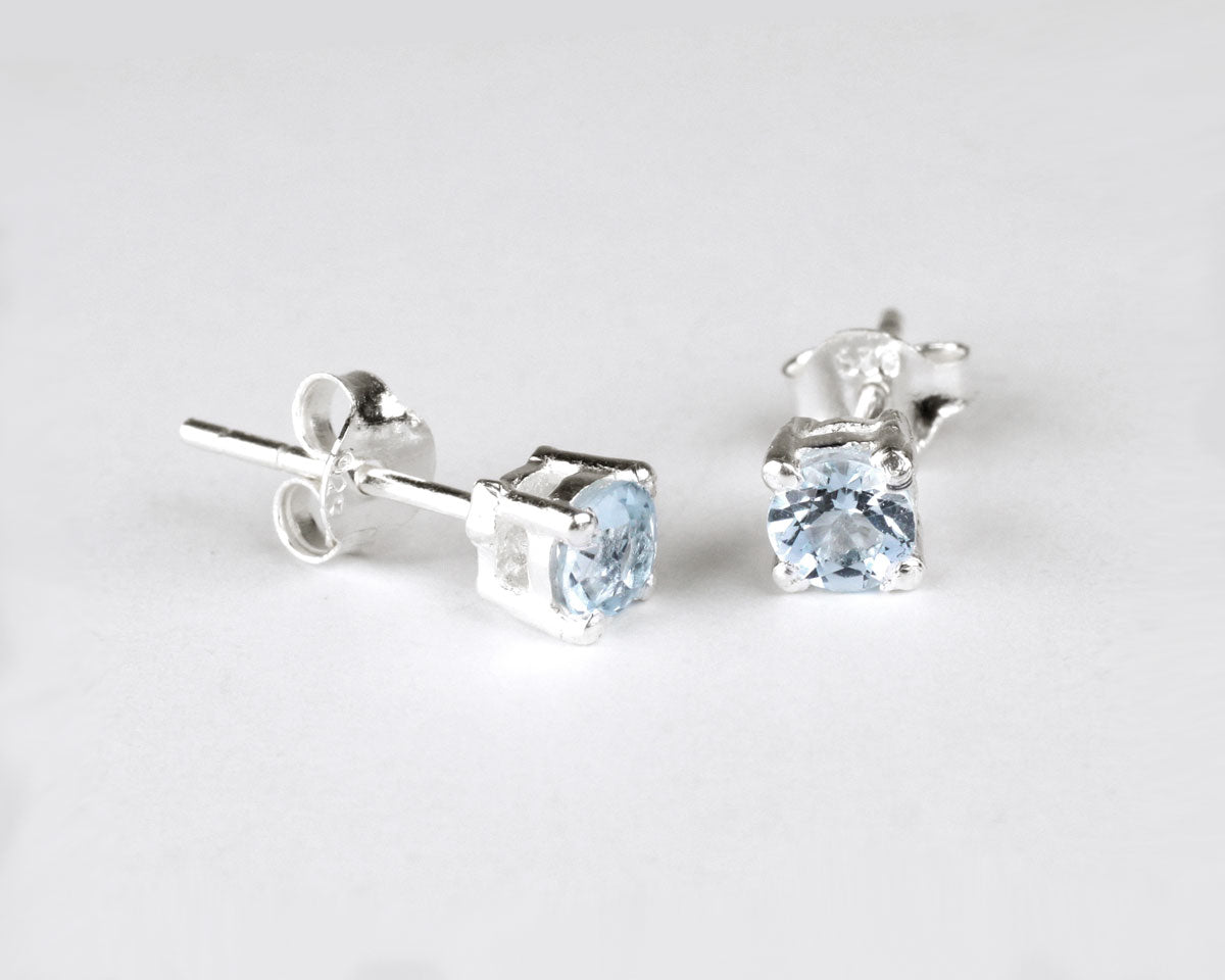 Topaz silver ear studs, 4 mm