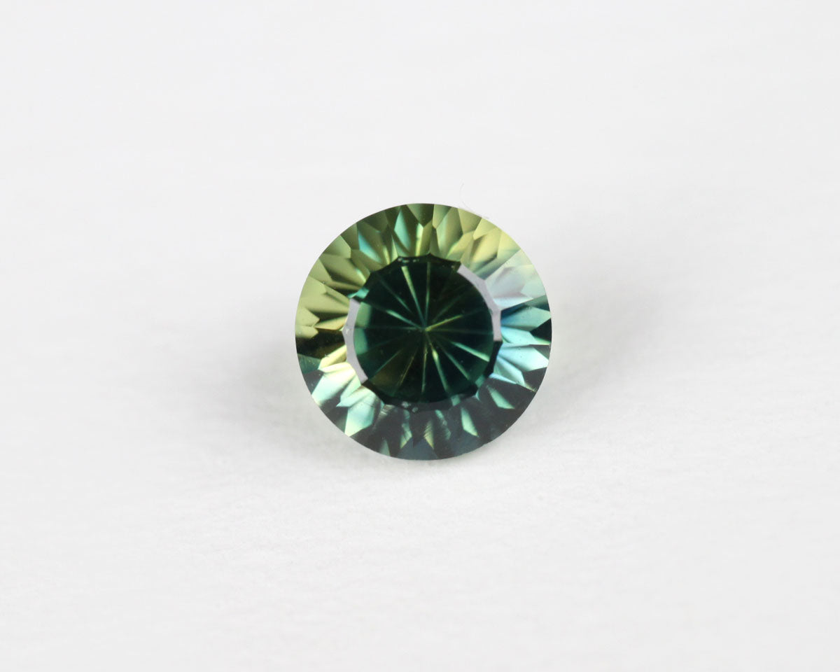 Safir blå/gul rund 5 mm 0,61 ct