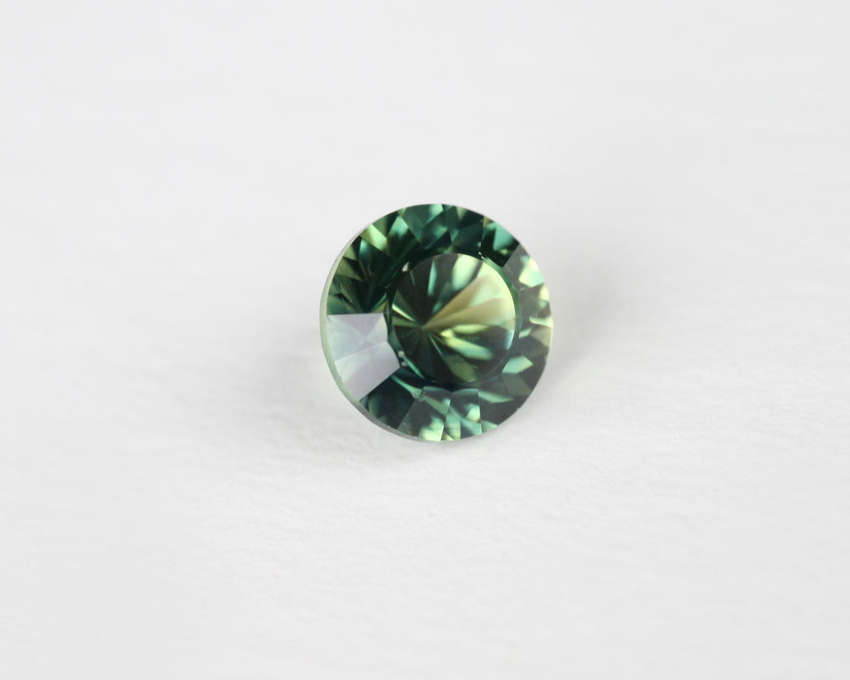 Safir blå/gul rund 5 mm 0,61 ct