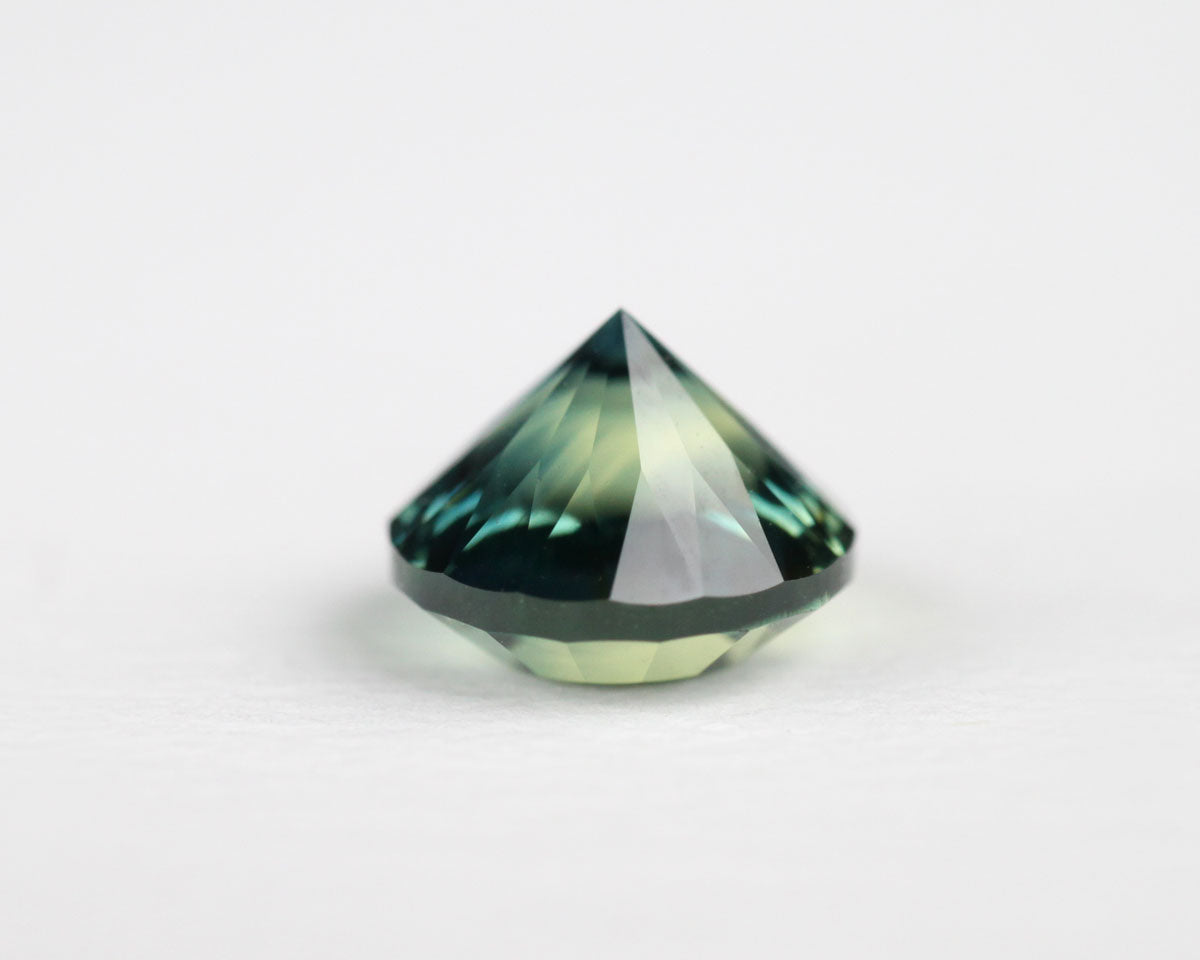 Safir blå/gul rund 5 mm 0,61 ct