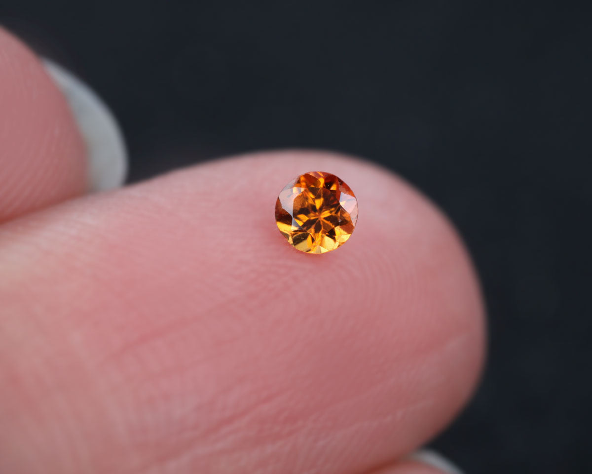 Orange sapphire round 0.13 ct
