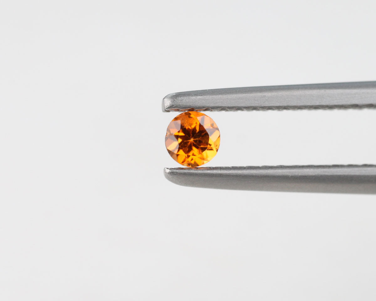 Orange sapphire round 0.13 ct