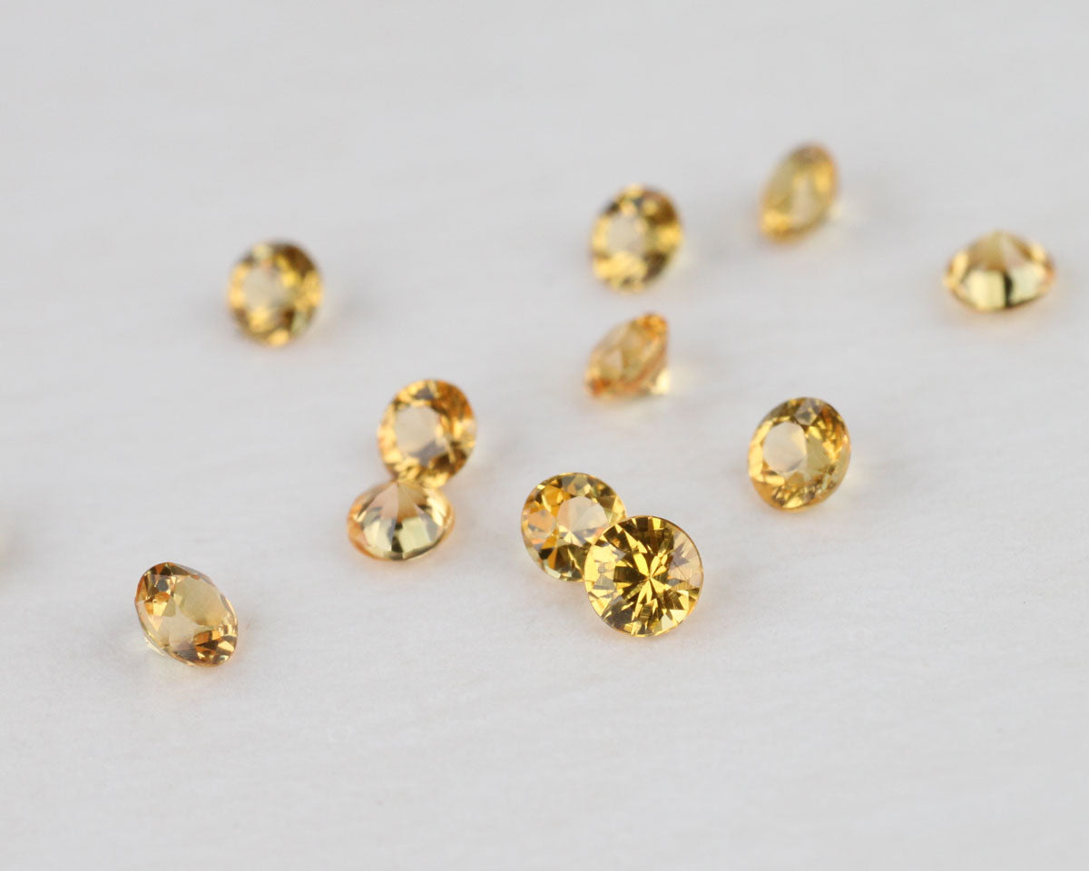 Yellow calibrated sapphires 2mm 0.05 ct
