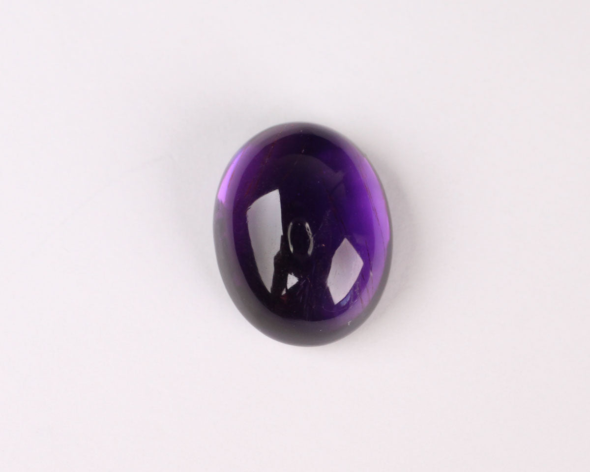 Ametist oval cabochon 14x11 mm 7 ct