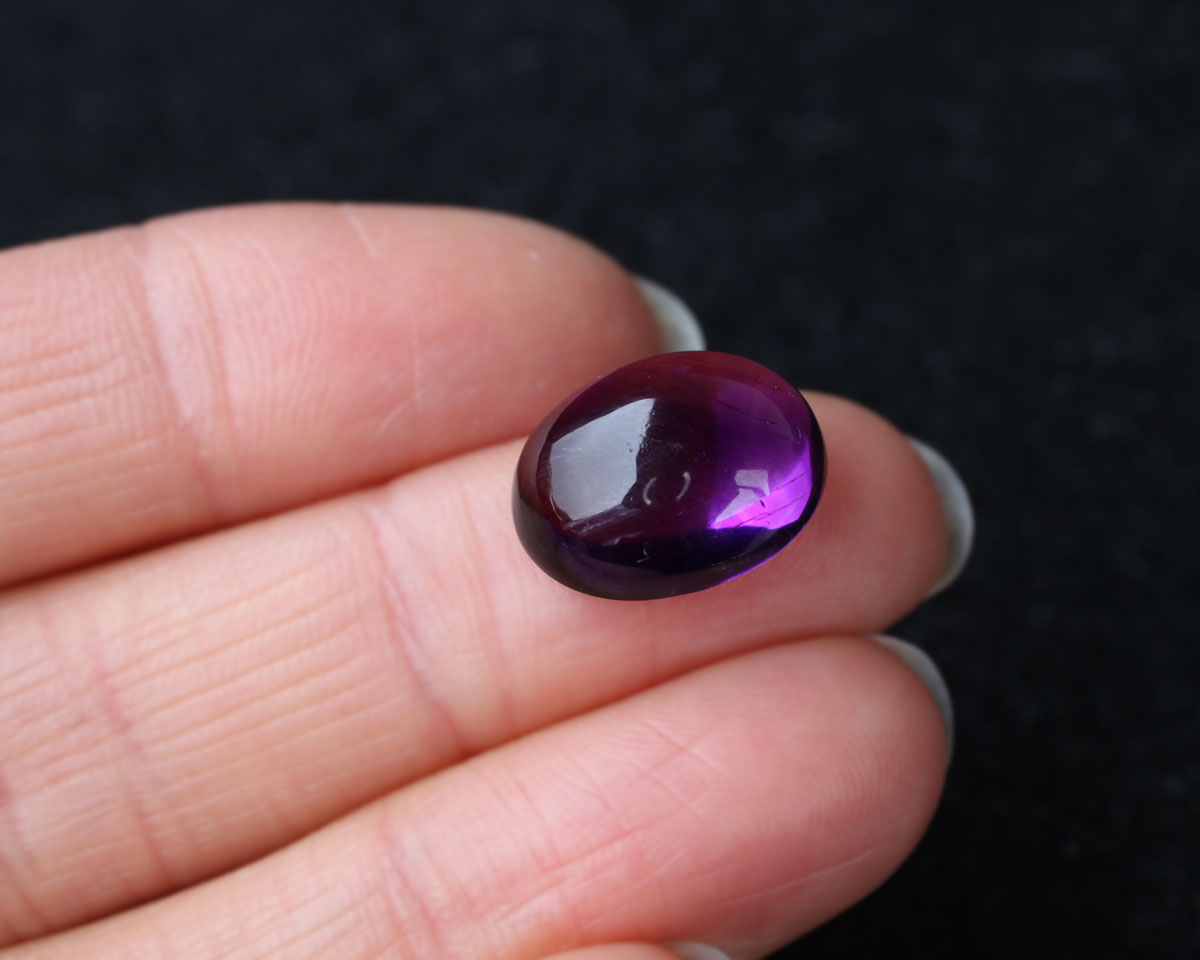 Ametist oval cabochon 14x11 mm 7 ct