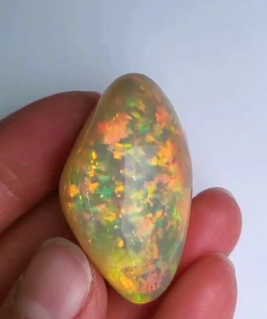 Rainbow Color Wollo Opal 61.77 ct