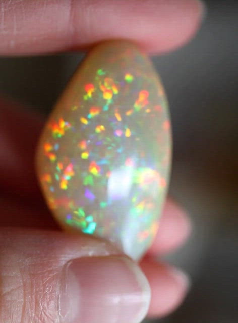 Rainbow Color Wollo Opal 61.77 ct