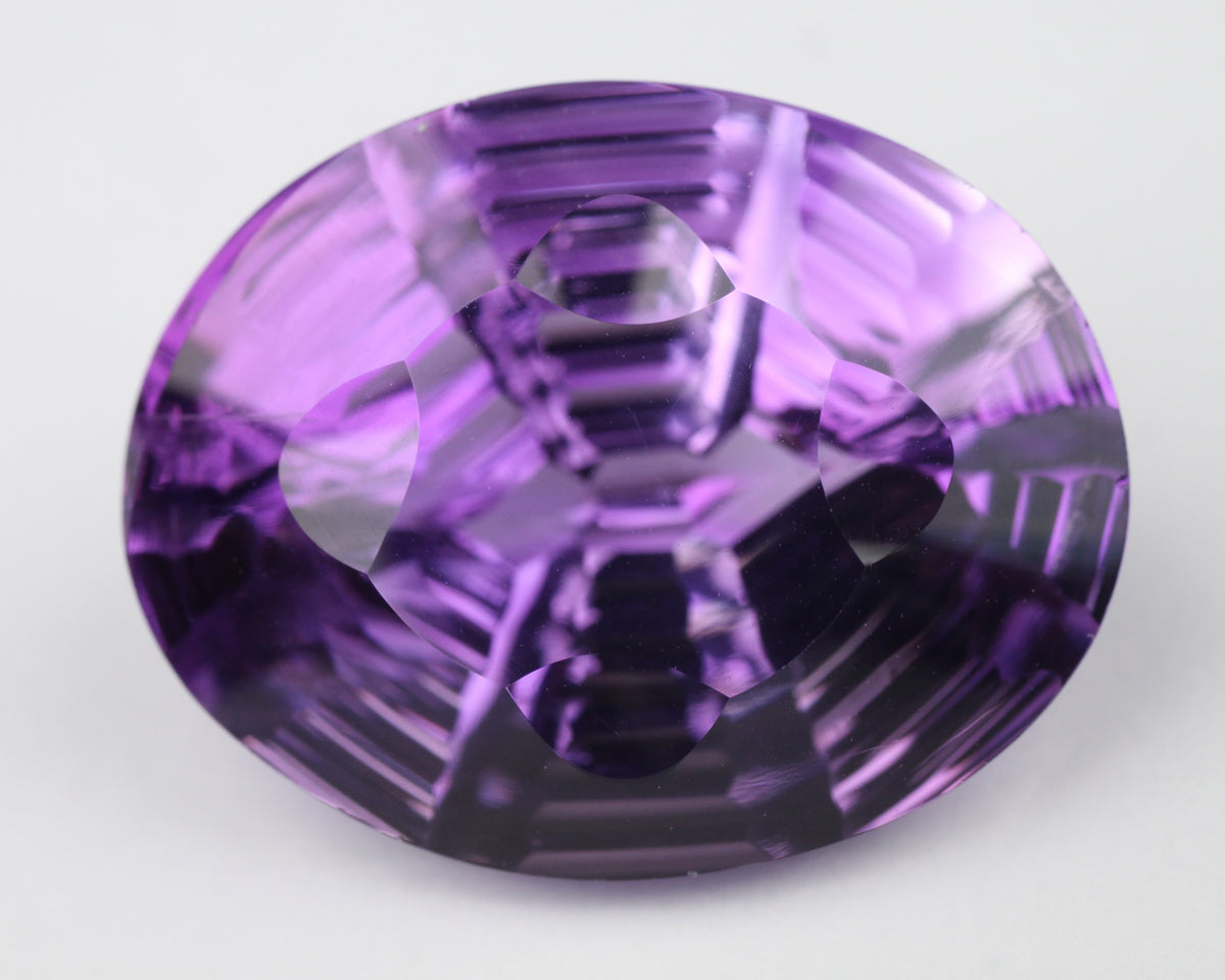 Amethyst oval stepcut 21 mm 21 ct