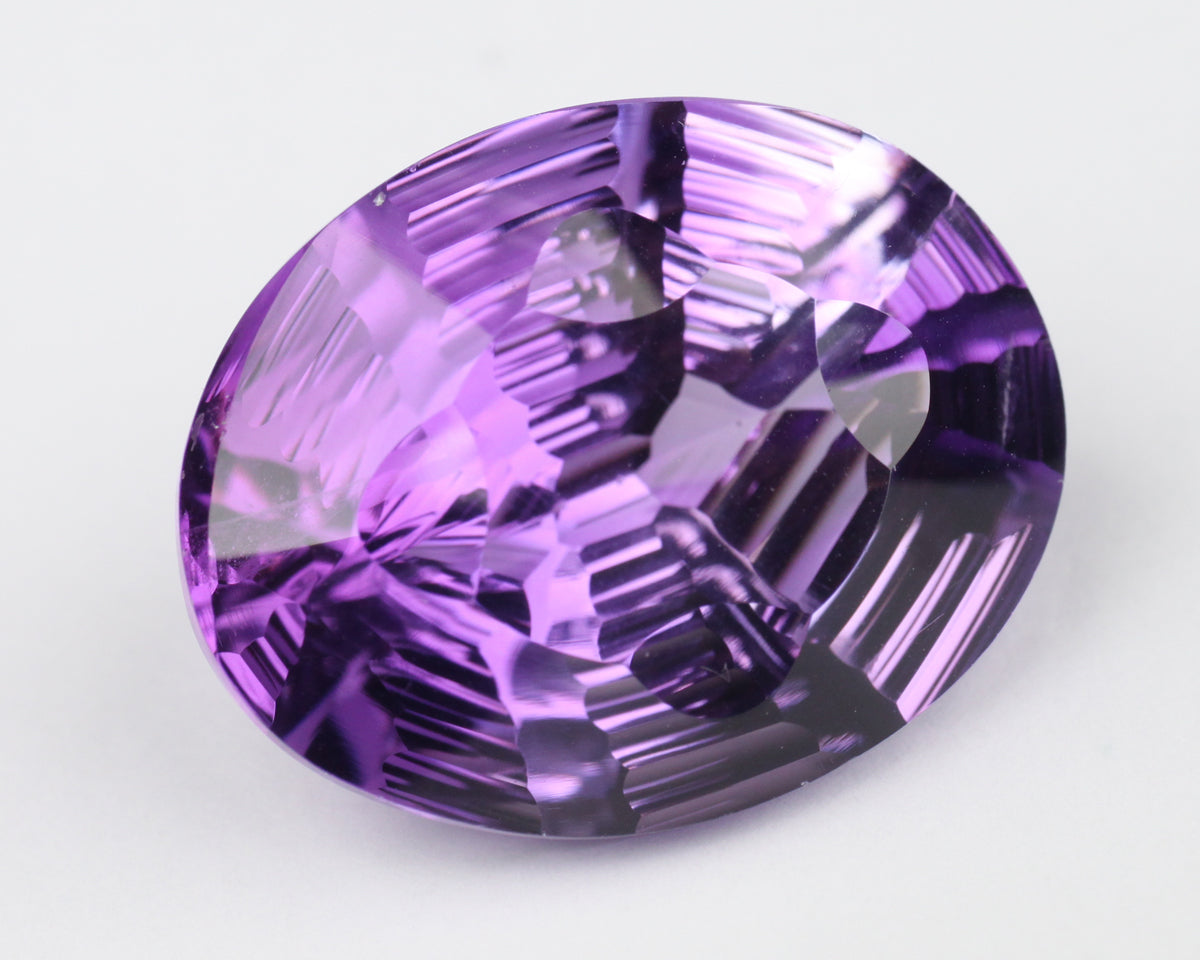 Amethyst oval stepcut 21 mm 21 ct