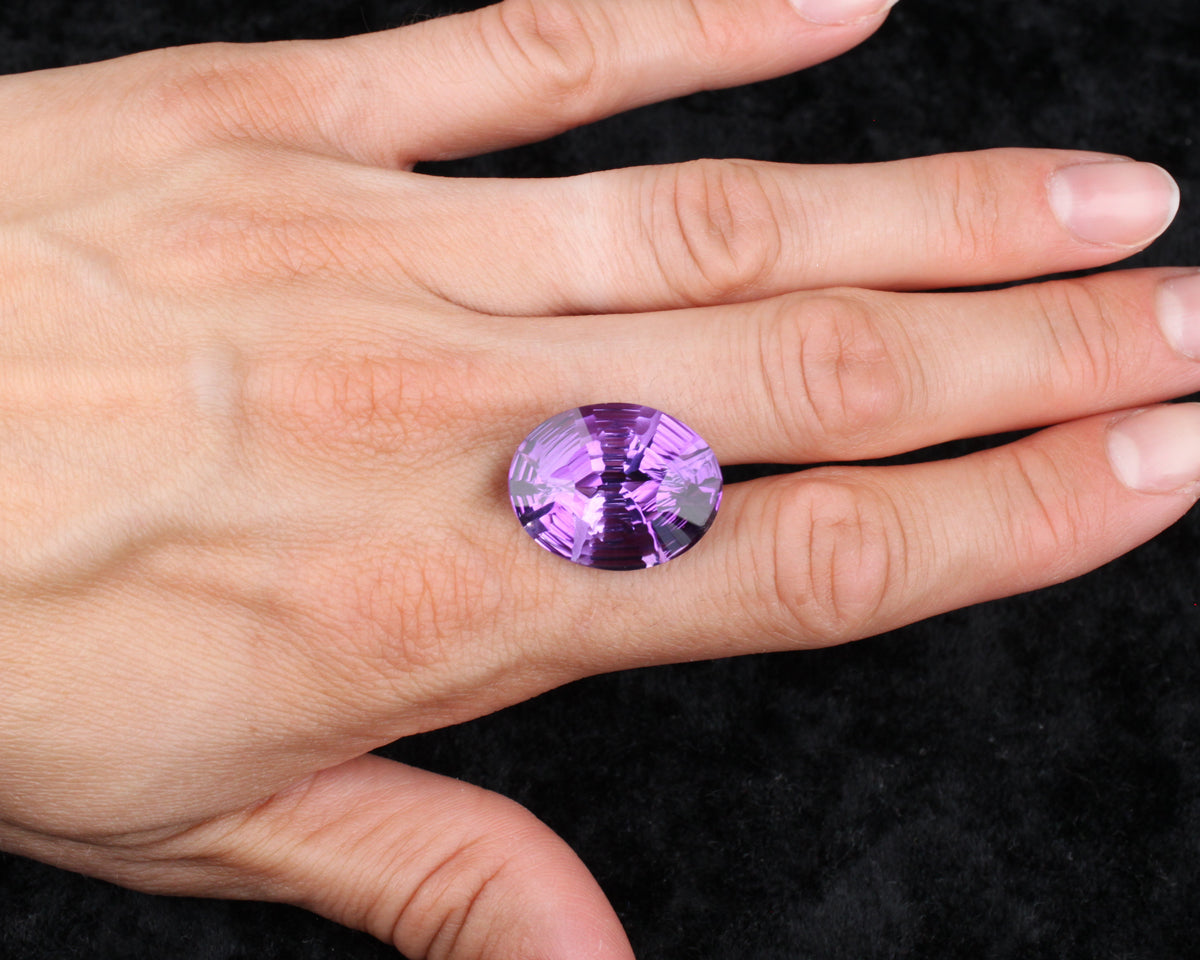 Amethyst oval stepcut 21 mm 21 ct