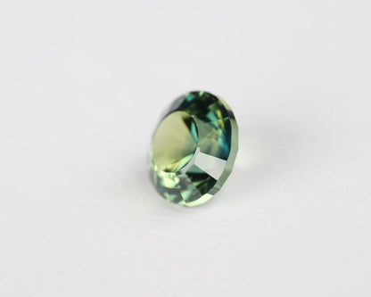 Safir blå/gul rund 5 mm 0,61 ct