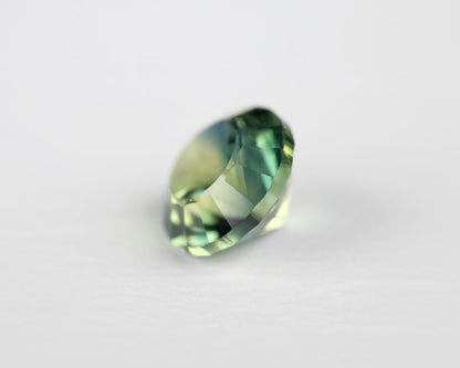 Safir blå/gul rund 5 mm 0,61 ct