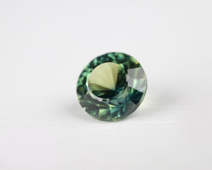 Safir blå/gul rund 5 mm 0,61 ct