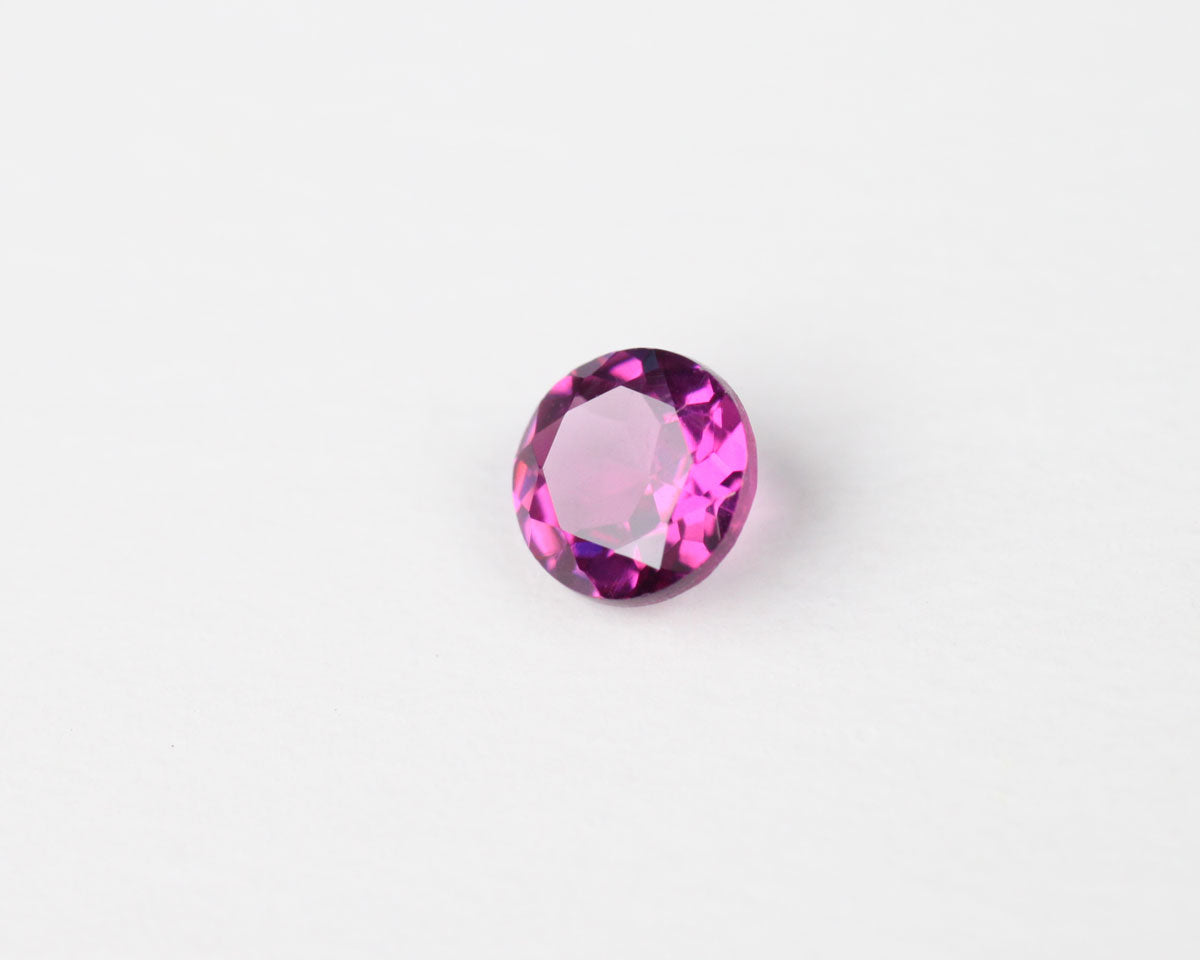 Granat rund lila 4 mm 0,3 ct