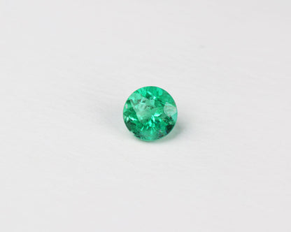 Shakiso Emerald rund 0,61 ct Certifierad