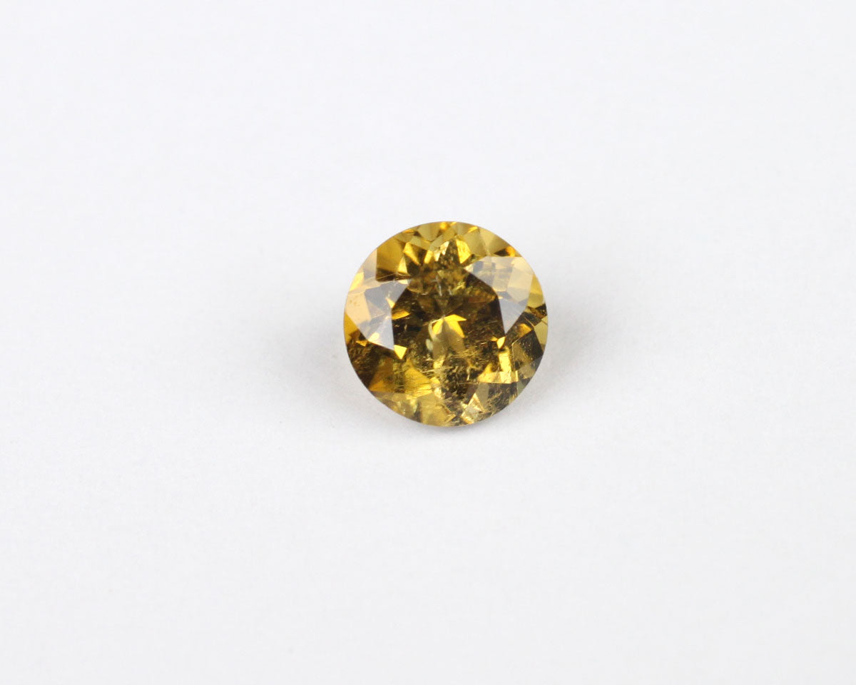 Tourmalin round yellow 5 mm 0.56 ct