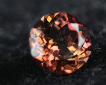 Tourmaline pinkish orange round 5 mm 0.45 ct