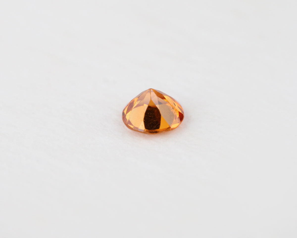 Orange sapphire round 0.13 ct