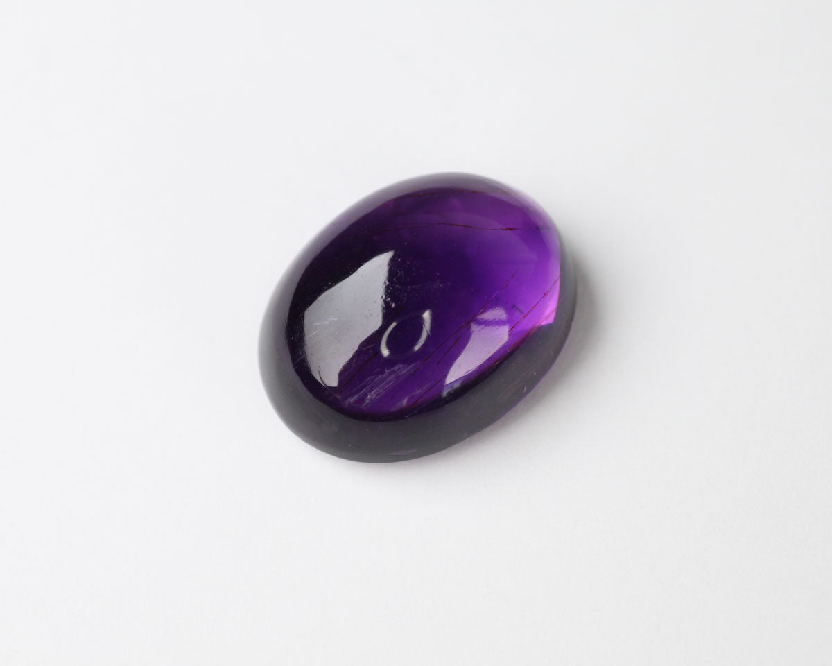 Amethyst oval cabochon 14x11 mm 7 ct