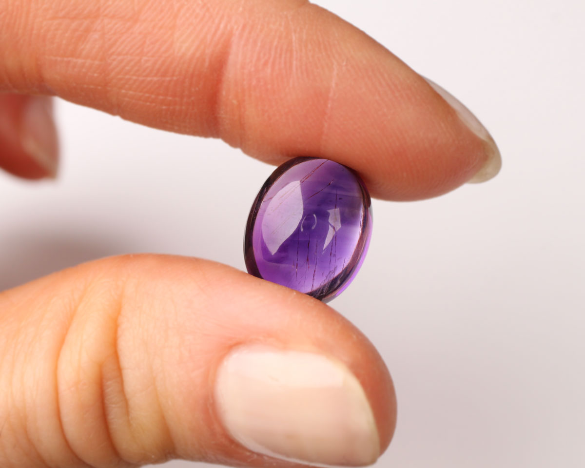 Amethyst oval cabochon 14x11 mm 7 ct