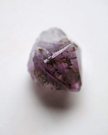 Rough amethyst crystal with inclutions