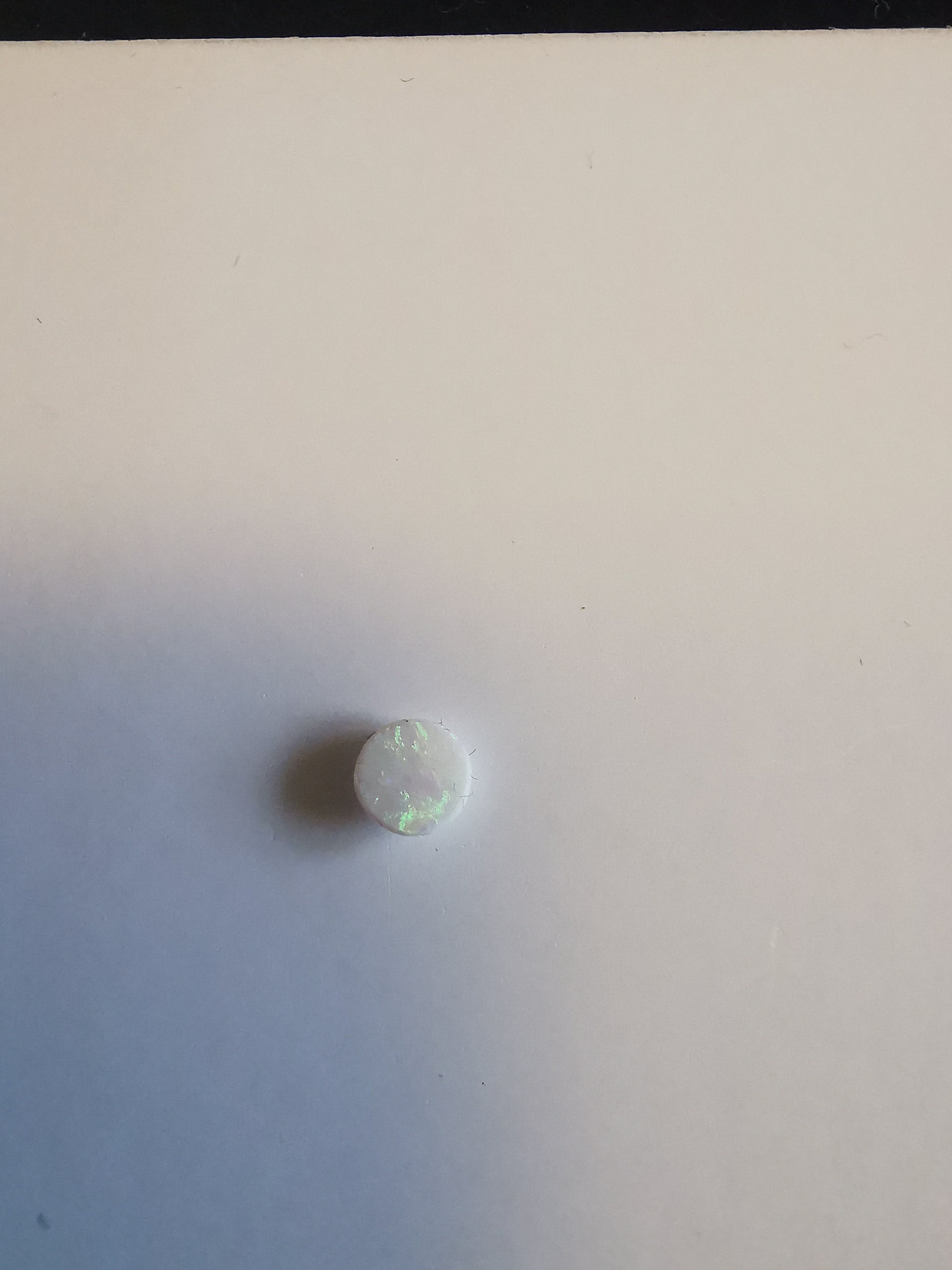 Australian White Opal Round 0.1 ct